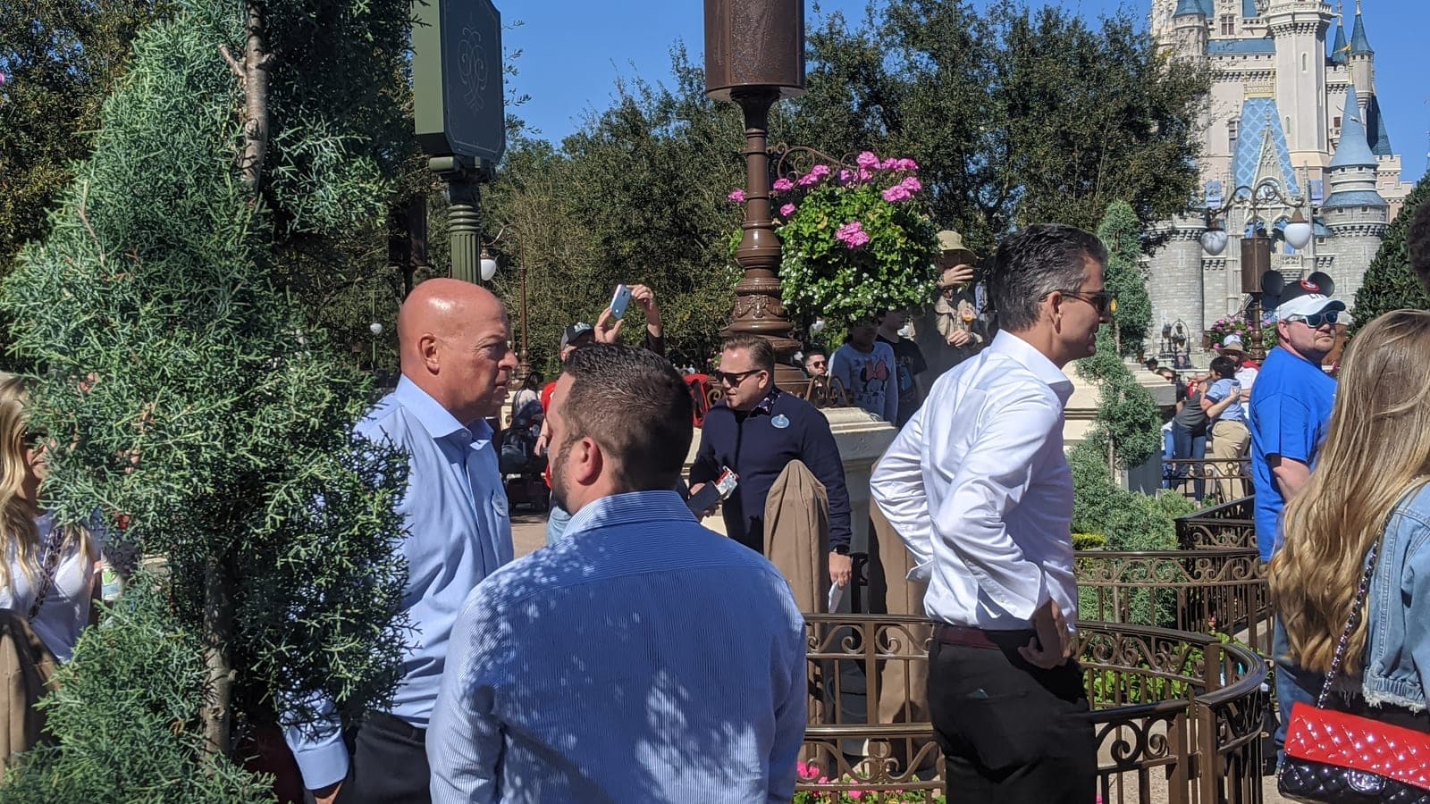 Josh D'Amaro and Bob Chapek photographed together at the Magic Kingdom in February 2020, three weeks before Chapek was named Disney's chief executive