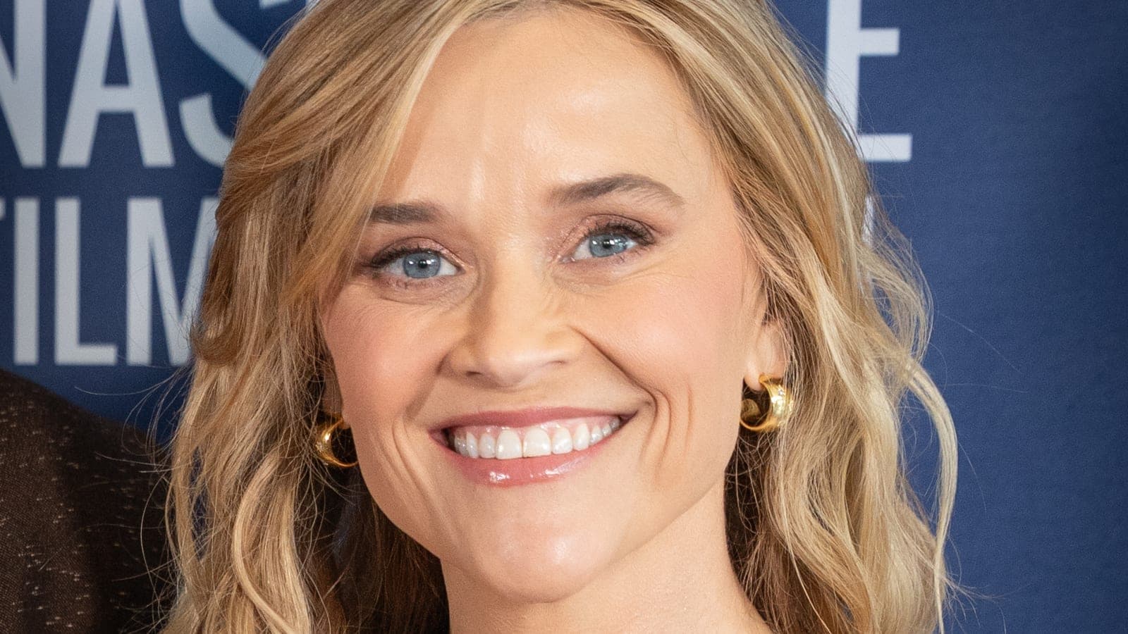 Reese Witherspoon smiling at the Nashville Film Festival premiere of Brother Save Us in September 2026